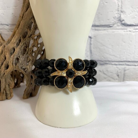 CAROL DAUPLAISE Faceted Black Bead Memory Bracelet with Rhinestone Medallion - Picture 1 of 6